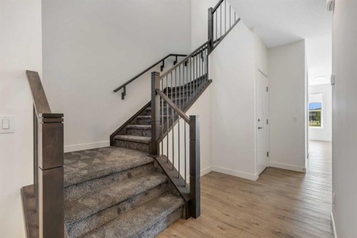 211 Creekstone Row Sw, Calgary, AB - Indoor Photo Showing Other Room