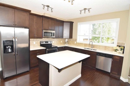 12 Legacy Gate Se, Calgary, AB - Indoor Photo Showing Kitchen With Stainless Steel Kitchen With Double Sink With Upgraded Kitchen