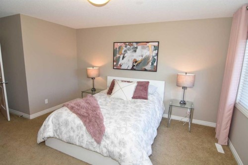 12 Legacy Gate Se, Calgary, AB - Indoor Photo Showing Bedroom