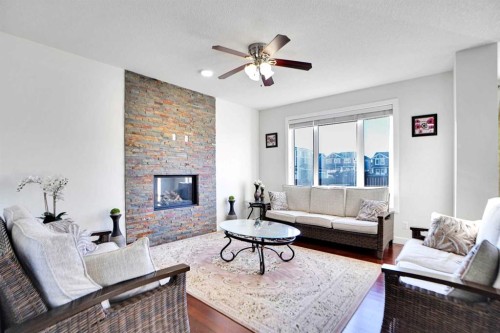 59 Redstone Park Ne, Calgary, AB - Indoor Photo Showing Living Room With Fireplace