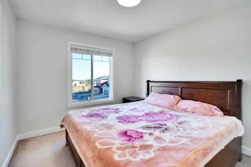 59 Redstone Park Ne, Calgary, AB - Indoor Photo Showing Bedroom
