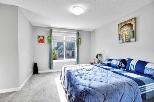 1322 Walden Drive Se, Calgary, AB - Indoor Photo Showing Bedroom