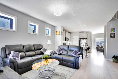 1322 Walden Drive Se, Calgary, AB - Indoor Photo Showing Living Room