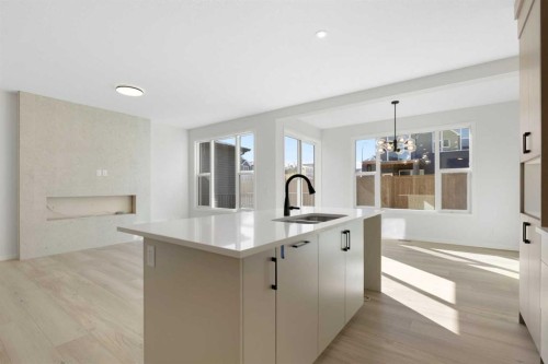 17 Marmot Passage Nw, Calgary, AB - Indoor Photo Showing Kitchen With Double Sink
