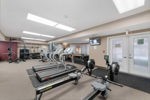 240-60 Royal Oak Plaza Nw, Calgary, AB - Indoor Photo Showing Gym Room