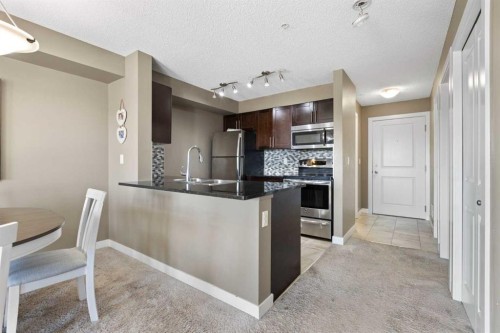 312-5 Saddlestone Way Ne, Calgary, AB - Indoor Photo Showing Other Room