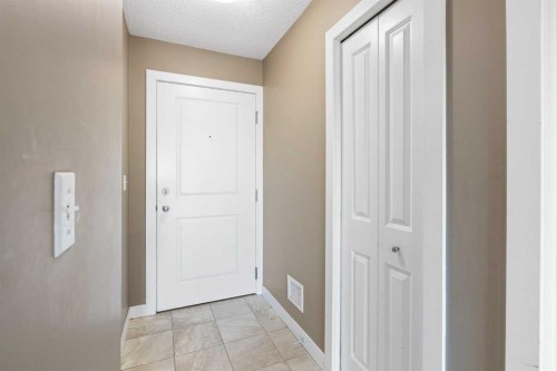 312-5 Saddlestone Way Ne, Calgary, AB - Indoor Photo Showing Other Room