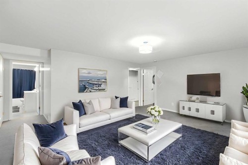 206 Mt Aberdeen Manor Se, Calgary, AB - Indoor Photo Showing Living Room