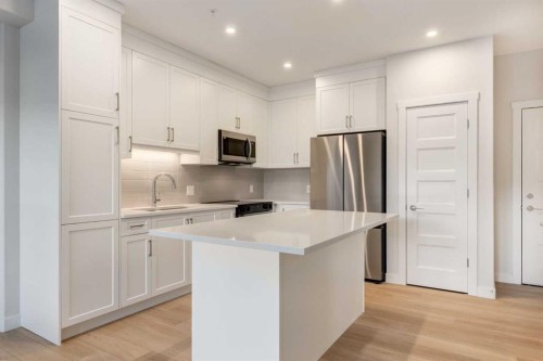 1203-81 Arbour Lake View Nw, Calgary, AB - Indoor Photo Showing Kitchen With Stainless Steel Kitchen With Upgraded Kitchen