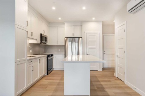 1203-81 Arbour Lake View Nw, Calgary, AB - Indoor Photo Showing Kitchen With Stainless Steel Kitchen With Upgraded Kitchen