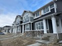 330 Sundown Road, Cochrane, AB  - Outdoor With Facade 