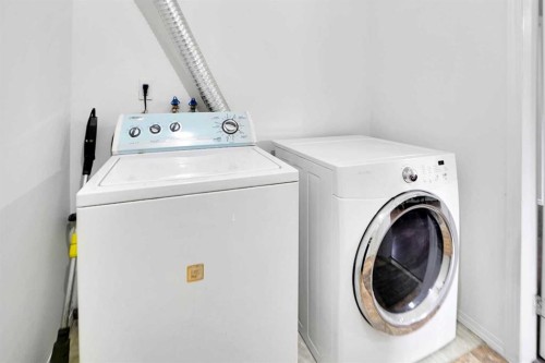 6032 Martingrove Road, Calgary, AB - Indoor Photo Showing Laundry Room