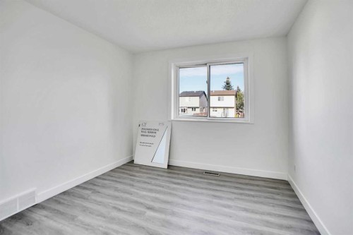 6032 Martingrove Road, Calgary, AB - Indoor Photo Showing Other Room