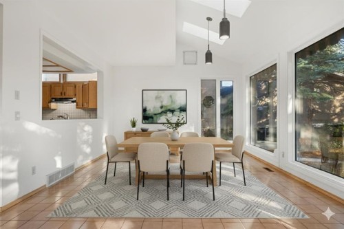 907 Shawnee Drive Sw, Calgary, AB - Indoor Photo Showing Dining Room