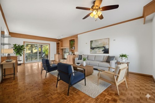 907 Shawnee Drive Sw, Calgary, AB - Indoor Photo Showing Living Room