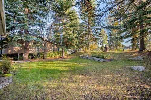 907 Shawnee Drive Sw, Calgary, AB - Outdoor