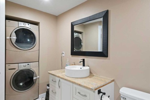818 Edgefield Street, Strathmore, AB - Indoor Photo Showing Laundry Room