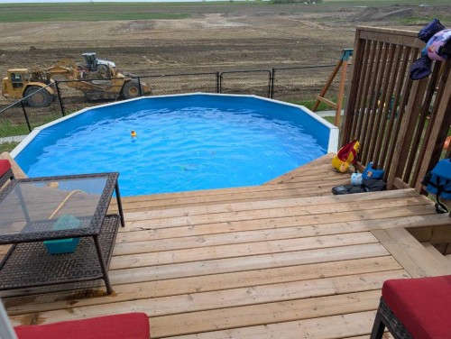 818 Edgefield Street, Strathmore, AB - Outdoor With Above Ground Pool