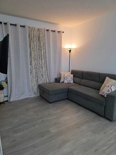 2204-333 Taravista Drive Ne, Calgary, AB - Indoor Photo Showing Living Room