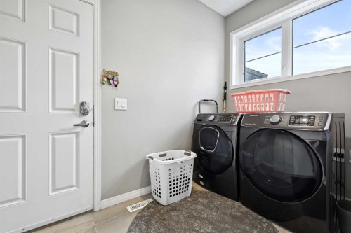 261 Carrington Circle Nw, Calgary, AB - Indoor Photo Showing Laundry Room
