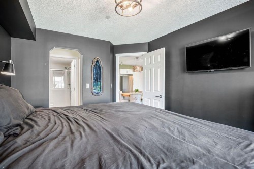 1311-755 Copperpond Boulevard Se, Calgary, AB - Indoor Photo Showing Bedroom
