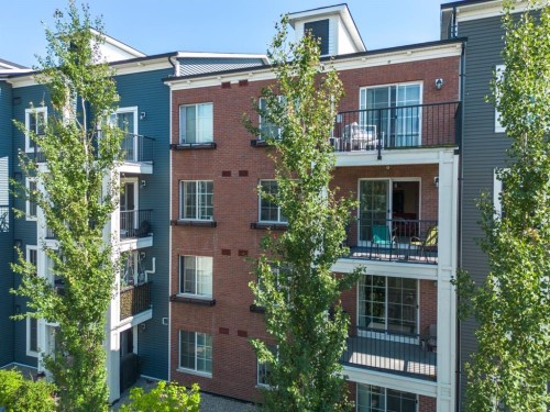 1311-755 Copperpond Boulevard Se, Calgary, AB - Outdoor With Facade