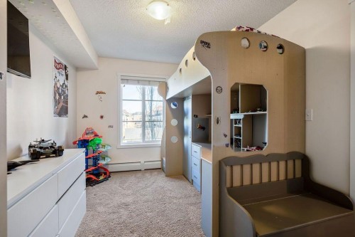 1311-755 Copperpond Boulevard Se, Calgary, AB - Indoor Photo Showing Other Room