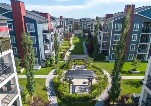 1311-755 Copperpond Boulevard Se, Calgary, AB - Outdoor With Facade