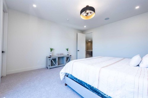 77 Waterford Crescent, Chestermere, AB - Indoor Photo Showing Bedroom