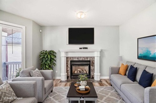 59 Tarington Way Ne, Calgary, AB - Indoor Photo Showing Living Room With Fireplace