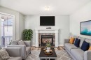 59 Tarington Way Ne, Calgary, AB  - Indoor Photo Showing Living Room With Fireplace 