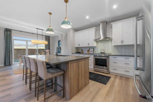 207 Brander Avenue, Langdon, AB - Indoor Photo Showing Kitchen With Upgraded Kitchen