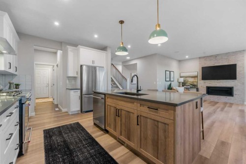 207 Brander Avenue, Langdon, AB - Indoor Photo Showing Kitchen With Stainless Steel Kitchen With Double Sink With Upgraded Kitchen