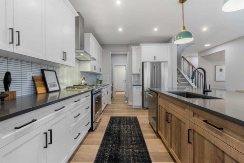207 Brander Avenue, Langdon, AB - Indoor Photo Showing Kitchen With Stainless Steel Kitchen With Upgraded Kitchen
