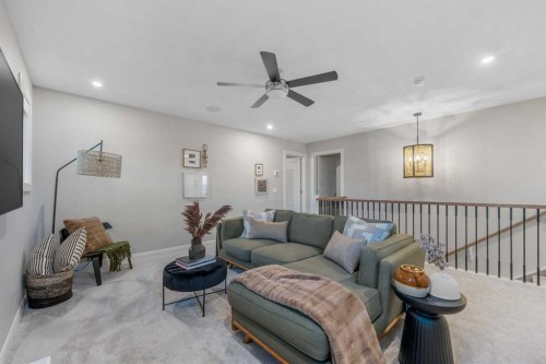 207 Brander Avenue, Langdon, AB - Indoor Photo Showing Living Room