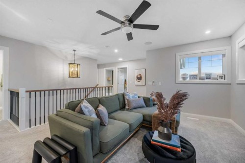 207 Brander Avenue, Langdon, AB - Indoor Photo Showing Living Room