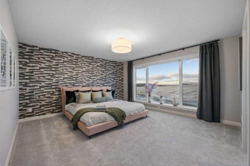 207 Brander Avenue, Langdon, AB - Indoor Photo Showing Bedroom