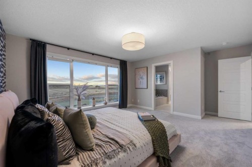 207 Brander Avenue, Langdon, AB - Indoor Photo Showing Bedroom