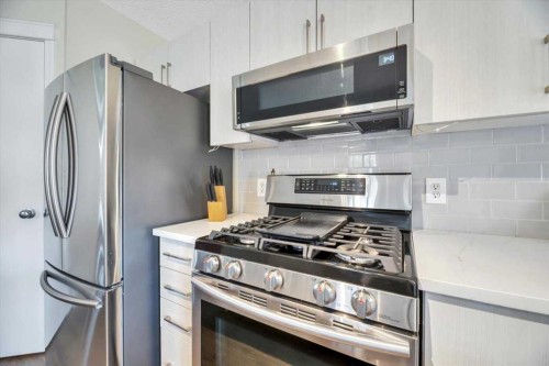 144 Prestwick Avenue, Calgary, AB - Indoor Photo Showing Kitchen With Stainless Steel Kitchen With Upgraded Kitchen