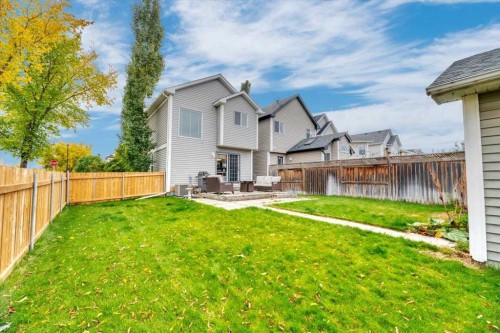 144 Prestwick Avenue, Calgary, AB - Outdoor With Backyard