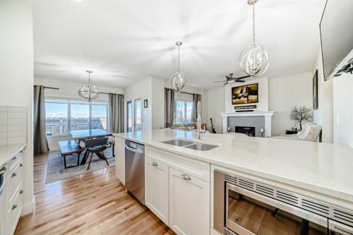 115 Mahogany Way Se, Calgary, AB - Indoor Photo Showing Kitchen With Double Sink With Upgraded Kitchen