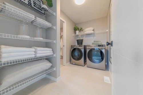 191 Lucas Common Nw, Calgary, AB - Indoor Photo Showing Laundry Room