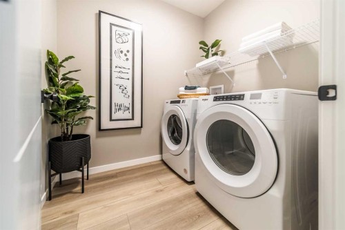 191 Lucas Common Nw, Calgary, AB - Indoor Photo Showing Laundry Room