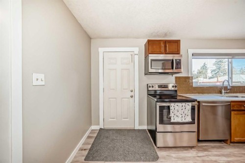 5414 Valentine Crescent Se, Calgary, AB - Indoor Photo Showing Kitchen With Stainless Steel Kitchen