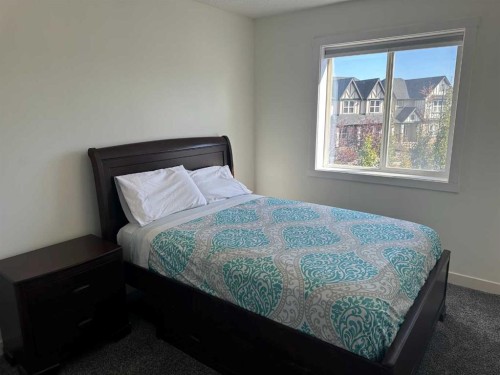 64 Elgin Meadows Manor Se, Calgary, AB - Indoor Photo Showing Bedroom