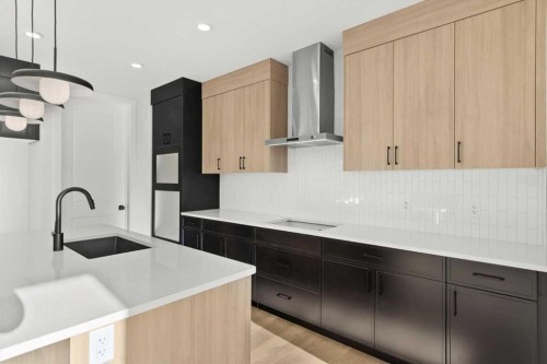 207 Perch Bend, Rural Rocky View County, AB - Indoor Photo Showing Kitchen