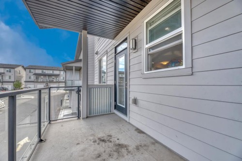 201-235 Redstone Walk Ne, Calgary, AB - Outdoor With Balcony With Exterior