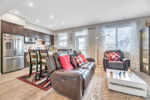 201-235 Redstone Walk Ne, Calgary, AB - Indoor Photo Showing Living Room