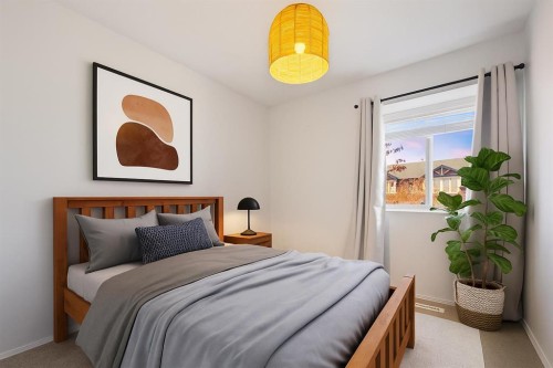 201-2066 Luxstone Boulevard Sw, Airdrie, AB - Indoor Photo Showing Bedroom
