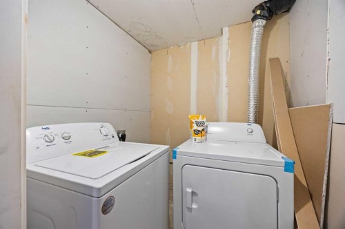 201-2066 Luxstone Boulevard Sw, Airdrie, AB - Indoor Photo Showing Laundry Room